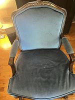 Front view showing upholstery and frame
