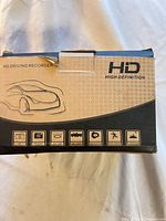 retail box showing HD Driving Recorder branding and feature icons