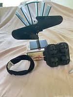 Ecofan stove fan, strap and skull mold grouped