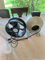 Both fans side by side showing overall condition and cords