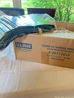 Closed box showing Uline label and product details