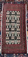 Full view of Turkman wool mat showing complete design and borders