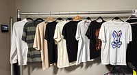 Rack showing all nine shirts