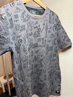 Front view of grey Vans graphic T-shirt