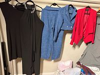 Overview of all five garments hanging