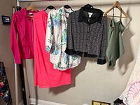 All five garments hanging on rack