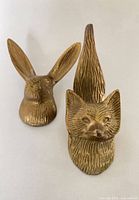 Front view fox and rabbit brass hooks