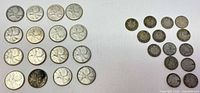 Overview of all coins laid out showing quarters left, dimes right