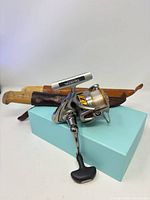 Overall lot: Daiwa reel and two sheathed knives