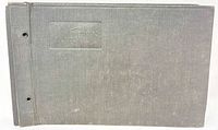 Front cover of gray cloth photo album