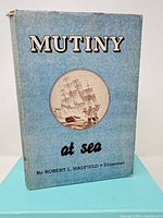 Front cover of Mutiny at Sea first edition showing full dust jacket