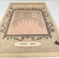 Front cover showing Needlecraft title and July 1917 date