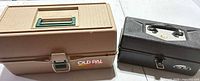 Tan and black Old Pal tackle boxes closed, full view