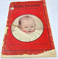 Front cover of January 1905 magazine showing baby portrait and heavy wear
