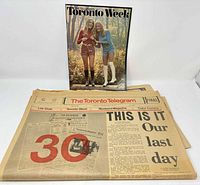 Newspaper, weekend magazine, folded poster front