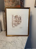 Front view of framed drawing showing artwork, mat and frame
