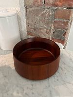 Overall view of teak salad bowl on countertop