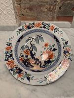 Front view showing full Imari chinoiserie design and condition