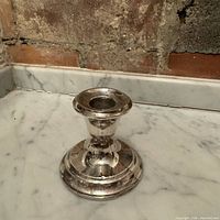 Full view of first sterling silver candlestick