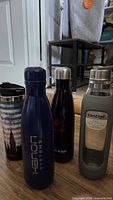 Group shot of all four drinkware items standing upright