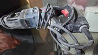Side view of Bosch Bulldog Xtreme rotary hammer showing cord and red trigger