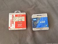 Front view of both sealed chain packages: SRAM PC 1071 and KMC e10