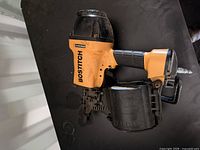 Left side of Bostitch coil framing nailer showing full tool