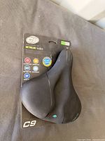Front view of Cloud-9 Metroline bike saddle in retail packaging