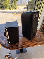 Ultimate Ears speaker and Sony speaker on table