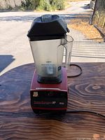 Full view of Vitamix BarBoss MP blender with jar and lid