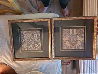Both framed prints side by side showing overall appearance