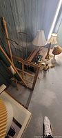 Overall lot showing lamps, board games and assorted items