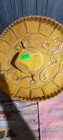 Underside view of yellow sombrero, shows sequin detail
