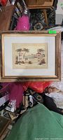 Framed print showing tropical scene