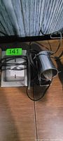 Desk clock and desk lamp bundled together showing overall condition and components