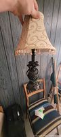 Full view of lamp showing base and shade