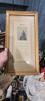 Front view of framed poem showing frame design, matting and content