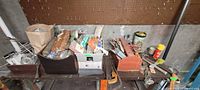 Overall view of workbench with assorted tools and hardware
