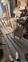 Pair of wooden chairs, white and brown, full view