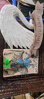 Both items: carved wooden swan with welcome plaque and ceramic horseman tile