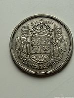 Reverse of 1956 Canadian 50-cent coin