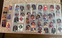 Overview of all cards including loose stack and multiple plastic sleeves