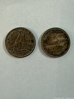 Obverse of both dimes showing designs