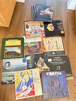 Group shot of multiple classical LPs laid out on floor
