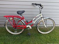 Full left side view of Schwinn 5 Star Cruiser showing frame, rack, fenders, tires