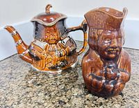 Both items: Toby teapot and jug side by side
