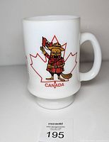 Front view showing CANADA graphic with Mountie beaver and maple leaf
