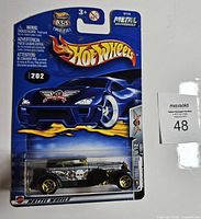 Front view of sealed Hot Wheels Final Run Duesenberg Model J