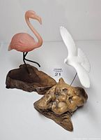 Both bird sculptures side by side, frontal view