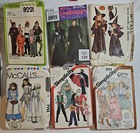 First image six pattern envelopes including Simplicity 8221, 5386, McCall’s witches, McCall’s girls’ dress, Simplicity 5742, Simplicity 5594